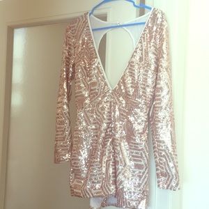 Sequined sparkly long sleeve deep v romper